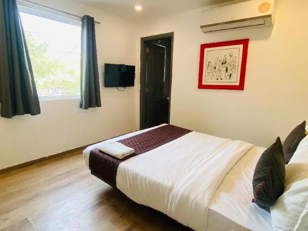 qotel hotel signature bnb ashok vihar