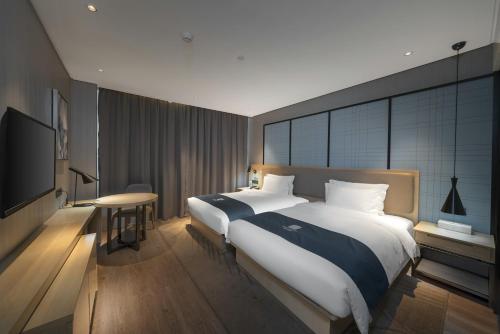 echarm hotel haikou zhongshan south road high speed railway east station