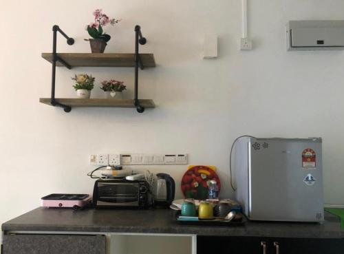 aeropod 5 mins to airport 10 mins to kk city