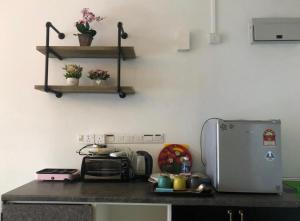 aeropod 5 mins to airport 10 mins to kk city