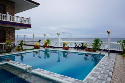 reddoorz plus billys resort oslob