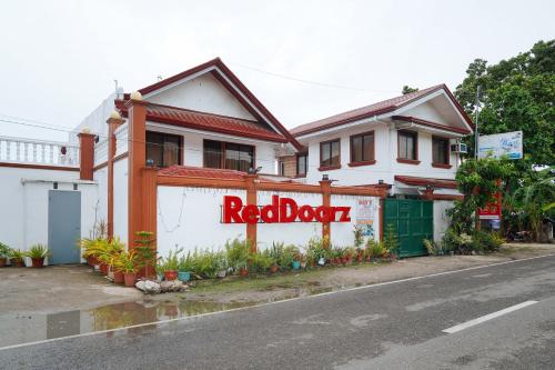 reddoorz plus billys resort oslob