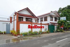 reddoorz plus billys resort oslob