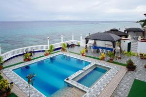 reddoorz plus billys resort oslob