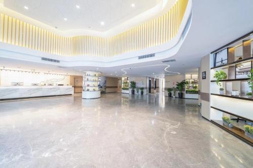atour hotel harbin songbei sunac mall