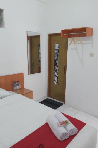 reddoorz near gor uny
