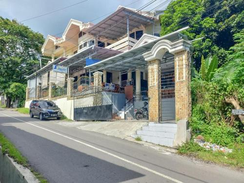 homestay singgasana redpartner