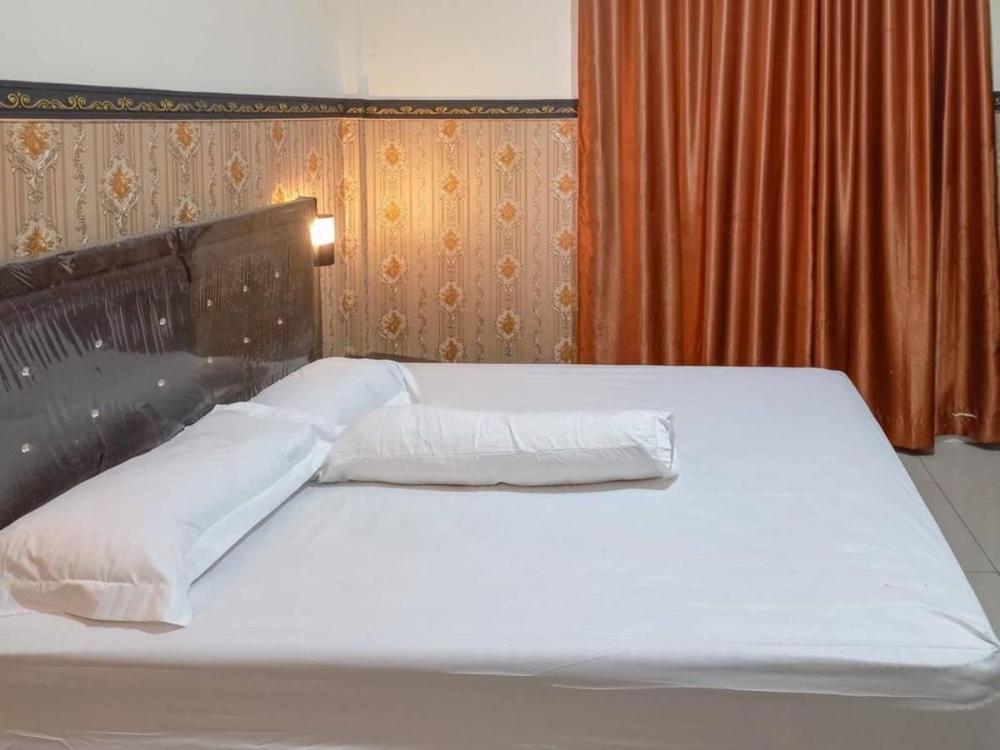 homestay singgasana redpartner