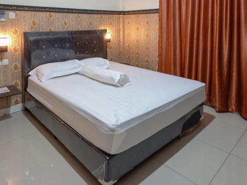 homestay singgasana redpartner