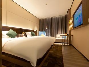 echarm plus hotel jingdezhen sanbao jiuji town