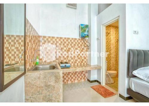 griya rahayu guesthouse redpartner near jatim park 2 batu