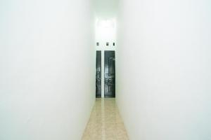 reddoorz aralia harapan indah