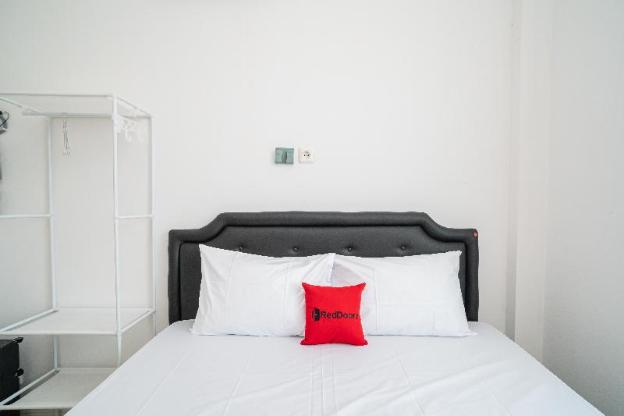 reddoorz aralia harapan indah