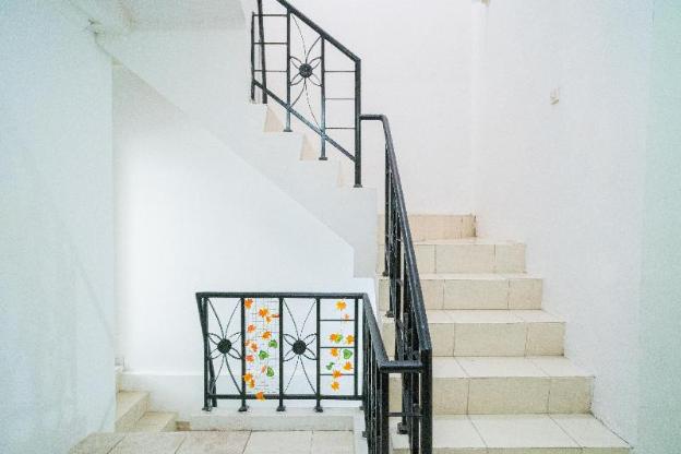 reddoorz aralia harapan indah