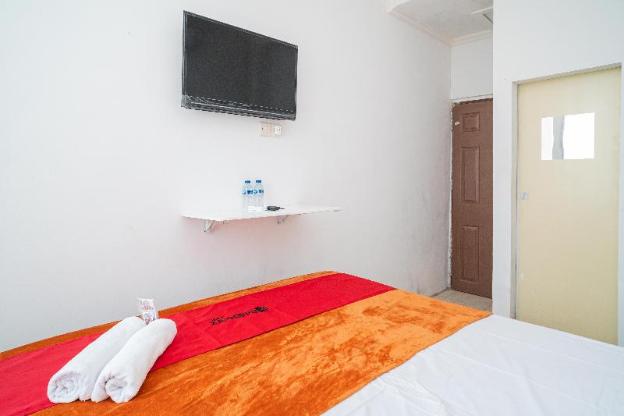 reddoorz aralia harapan indah