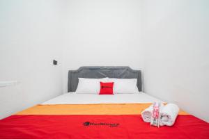 reddoorz aralia harapan indah