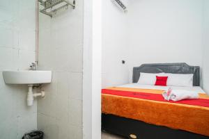 reddoorz aralia harapan indah