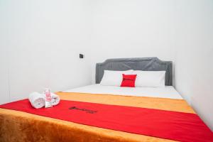 reddoorz aralia harapan indah