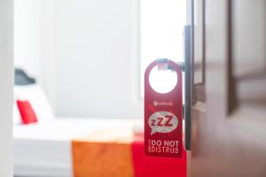 reddoorz aralia harapan indah