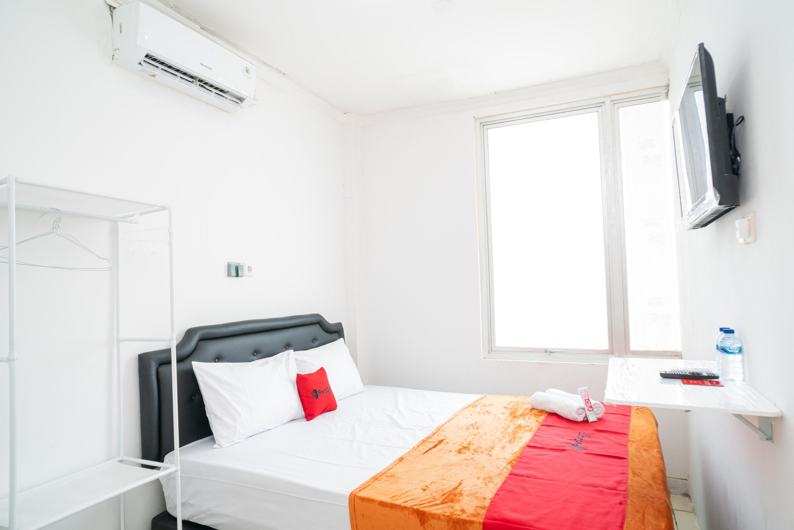 reddoorz aralia harapan indah