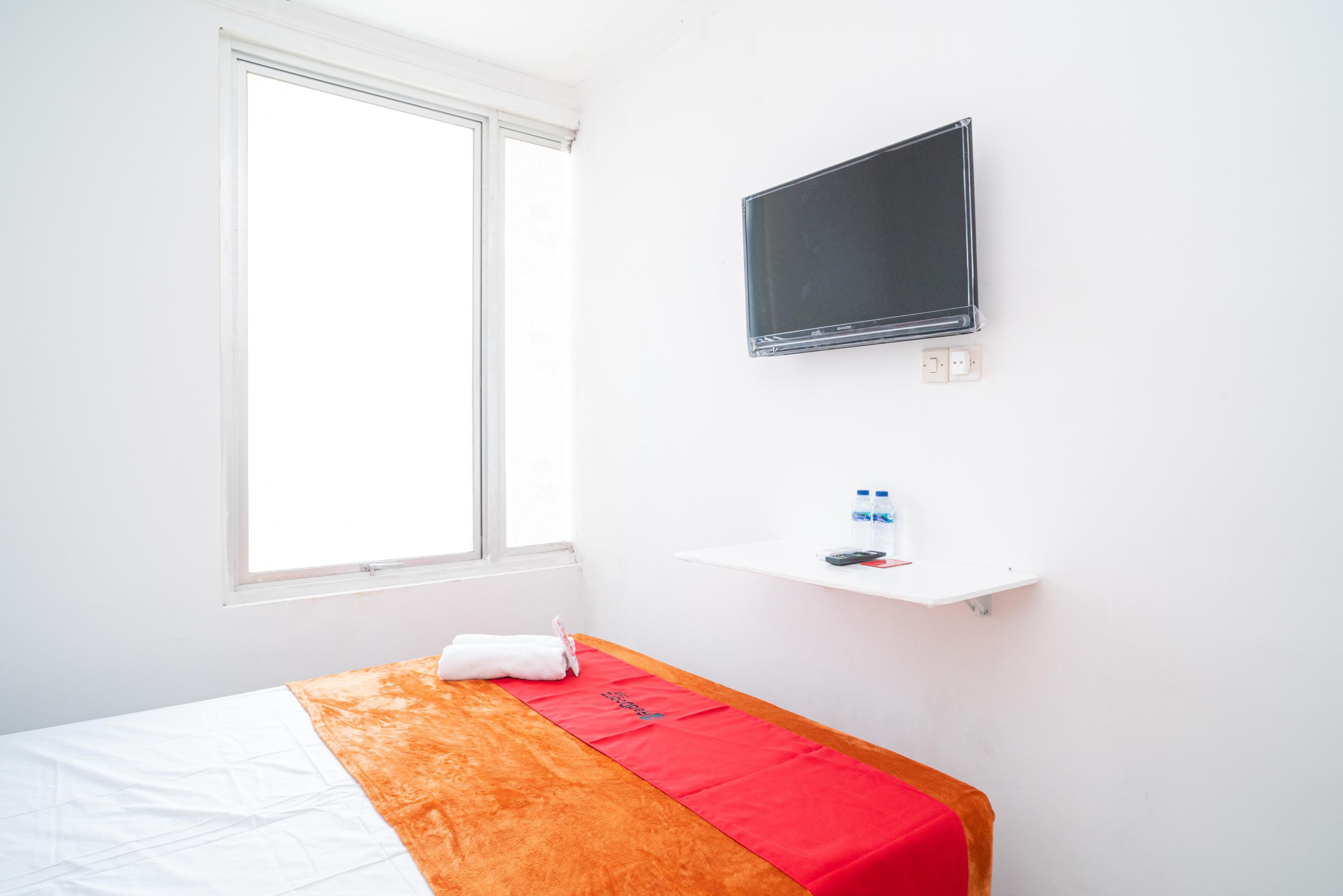 reddoorz aralia harapan indah