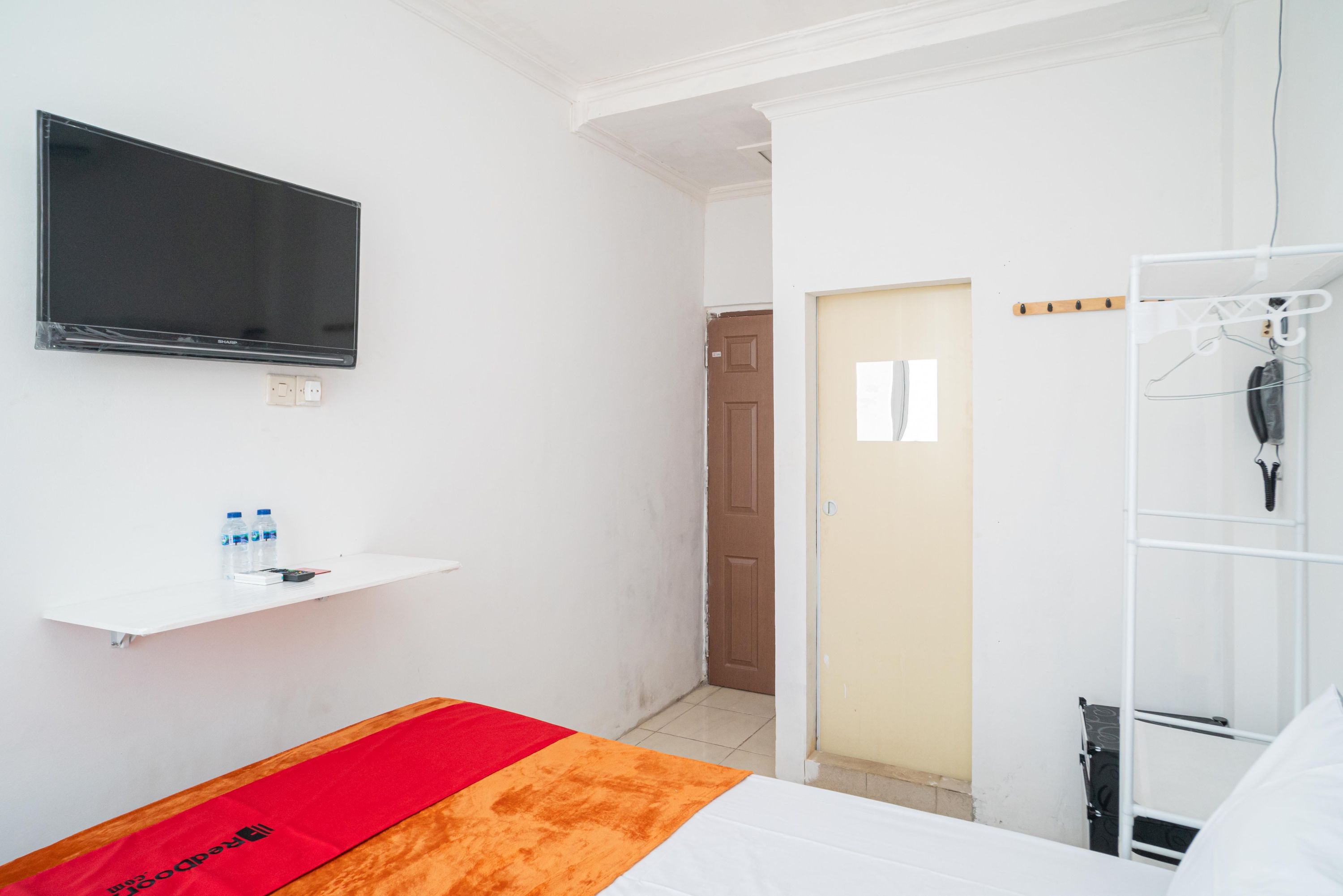 reddoorz aralia harapan indah