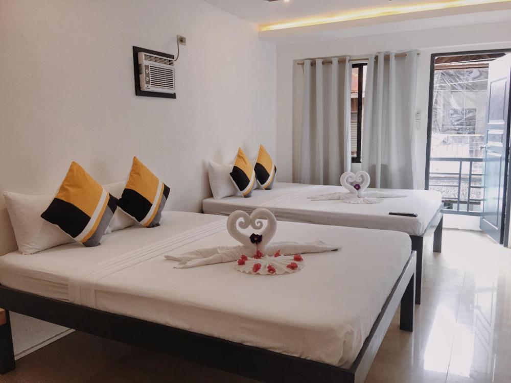 palmera el nido inn
