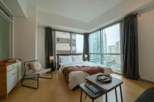 prime bgc location apartments by ph staycation