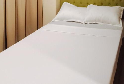 reddoorz benelio suites pavia iloilo