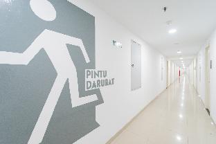 redliving apartemen patra land urbano happy rooms tower mid west with netflix