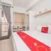 redliving apartemen transpark juanda frams properti tower jade with netflix