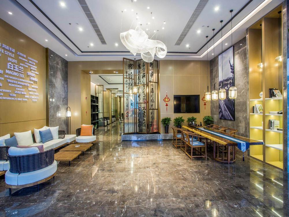 magnotel business zhenjiang south railway station greenland square