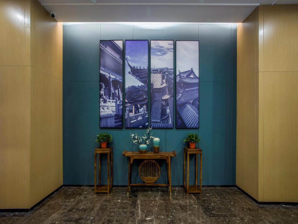 magnotel business zhenjiang south railway station greenland square