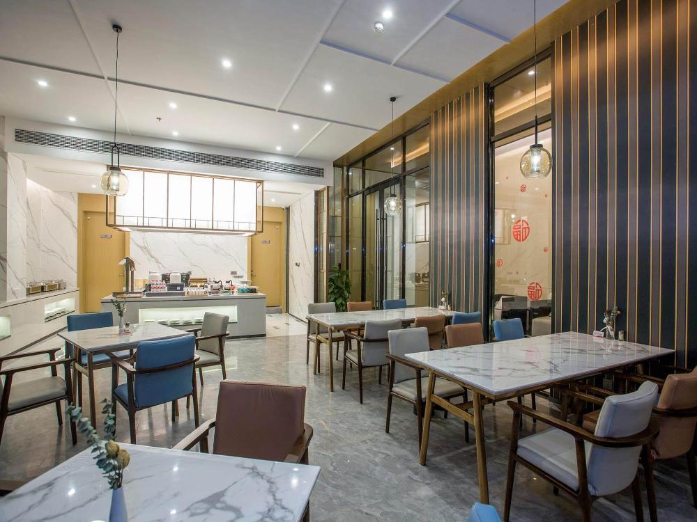 magnotel business zhenjiang south railway station greenland square