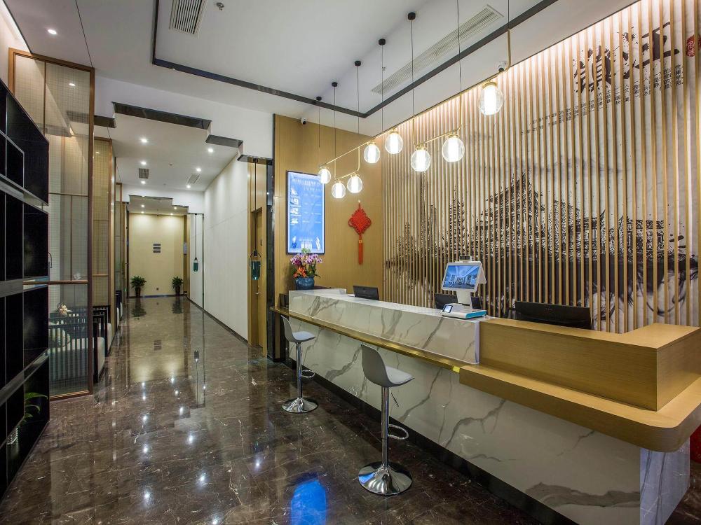 magnotel business zhenjiang south railway station greenland square