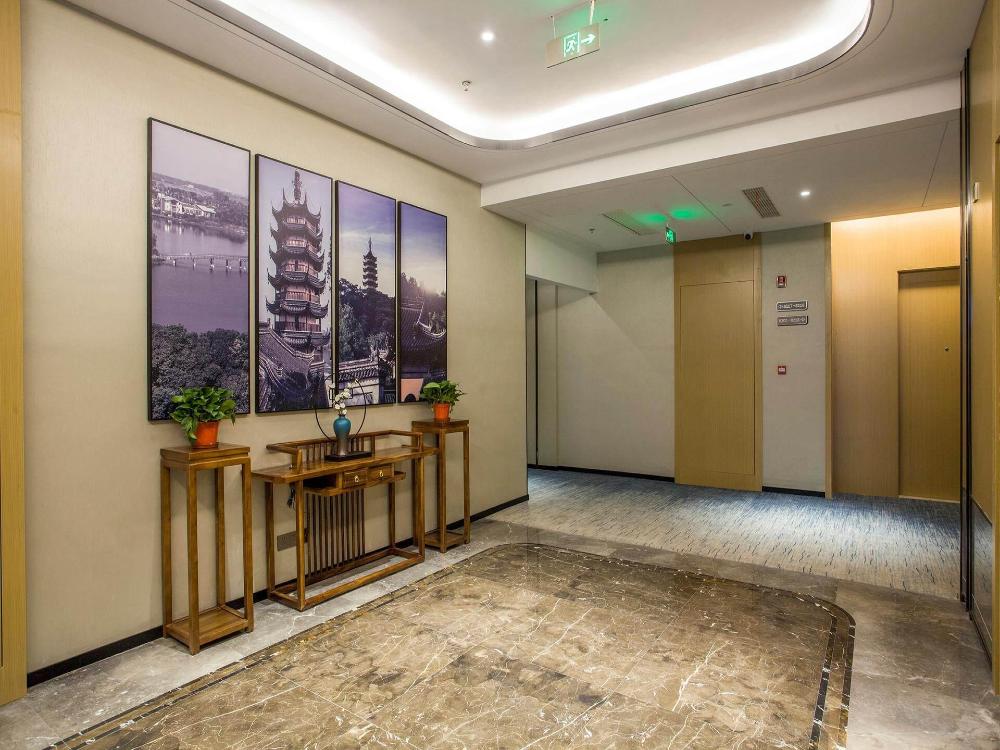 magnotel business zhenjiang south railway station greenland square