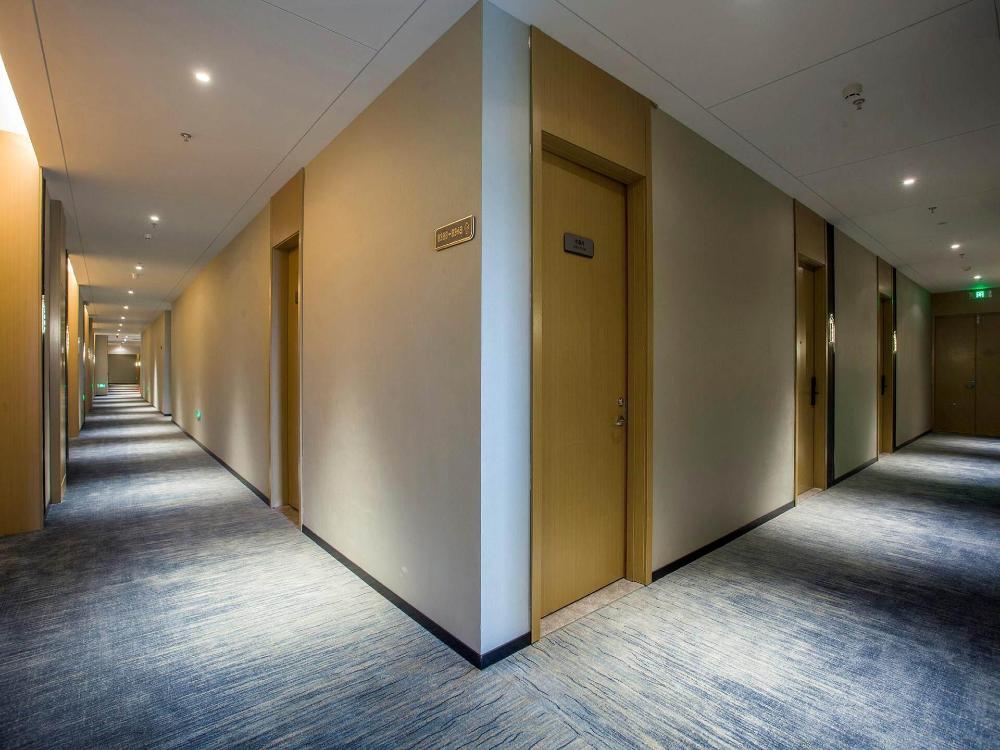 magnotel business zhenjiang south railway station greenland square