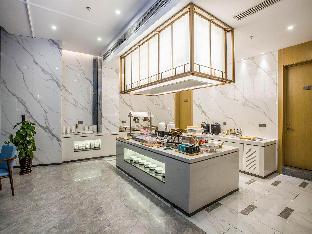 magnotel business zhenjiang south railway station greenland square