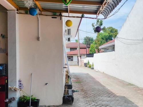 new era family homestay binjai redpartner