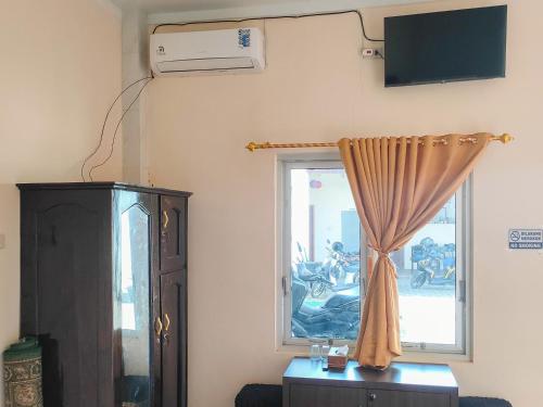new era family homestay binjai redpartner