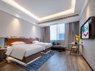 echarm hotel hechi bama