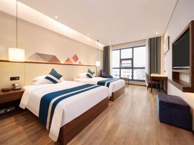 borrman hotel huaihua south high speed railway station wanda plaza