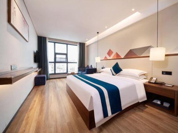 borrman hotel huaihua south high speed railway station wanda plaza