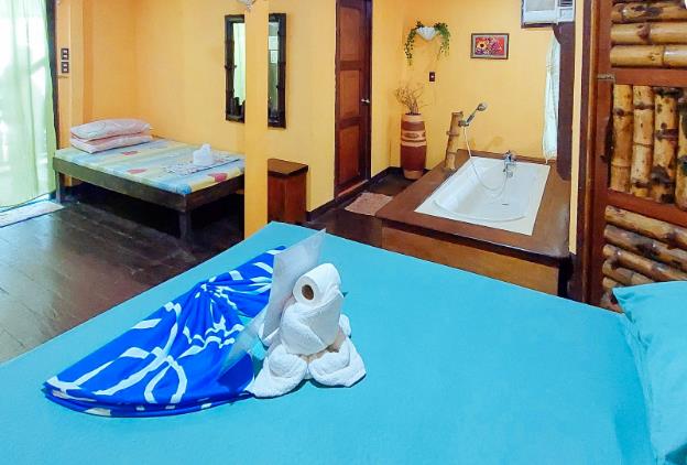 reddoorz island front cottages el nido