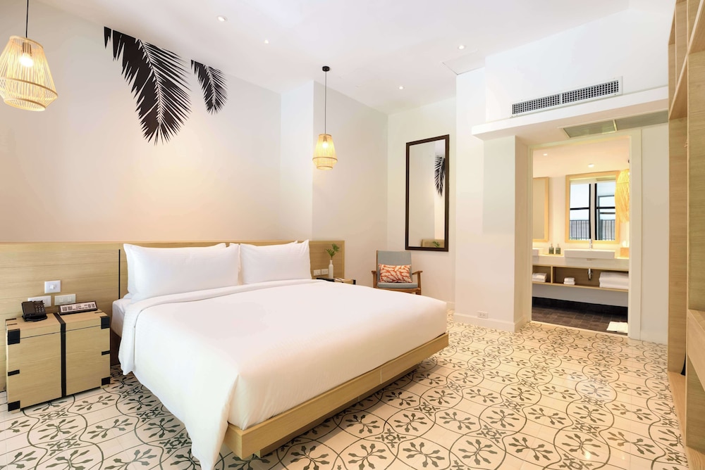 outrigger surin beach resort
