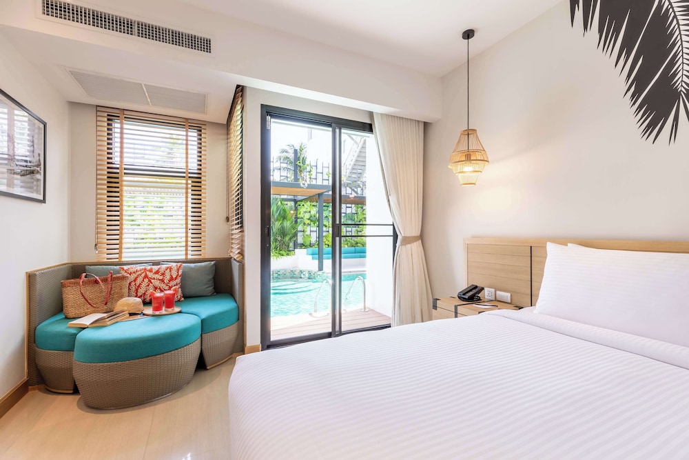 outrigger surin beach resort