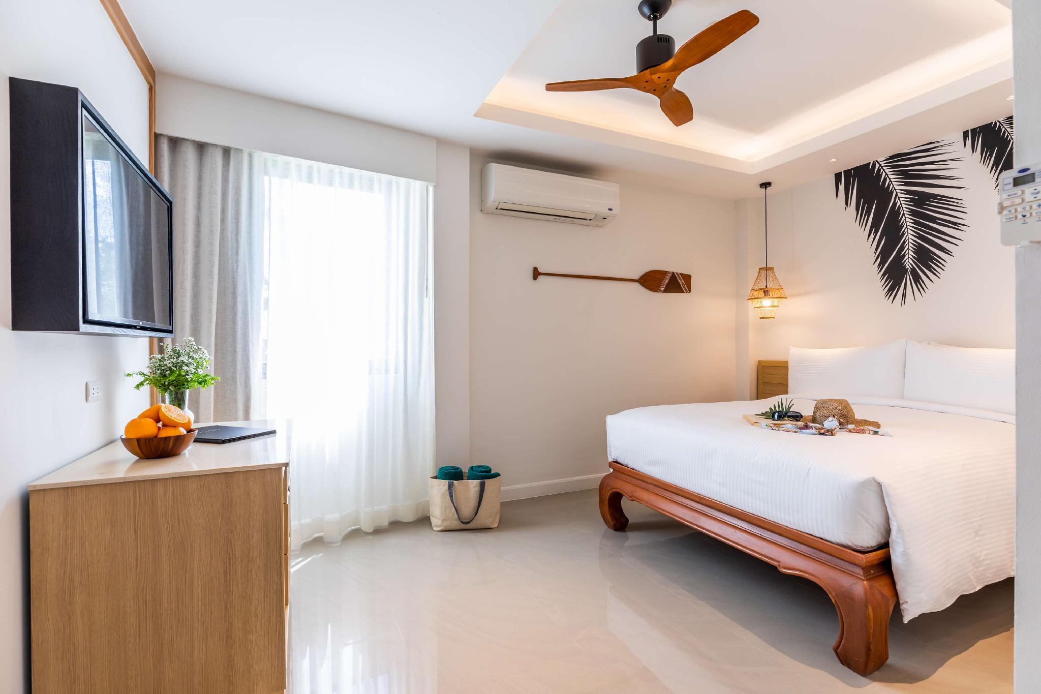 outrigger surin beach resort