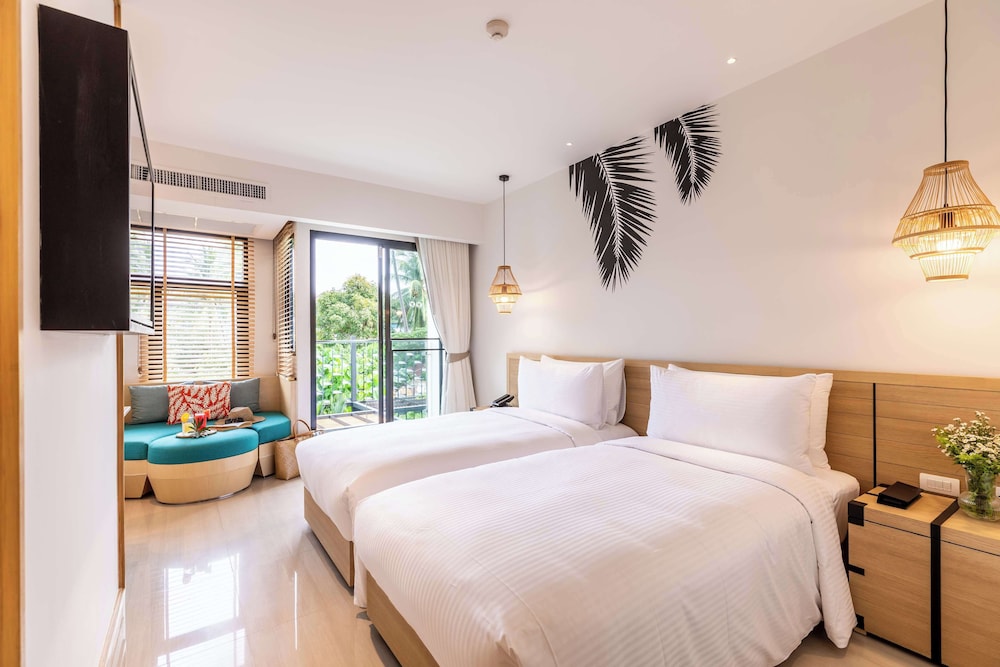 outrigger surin beach resort