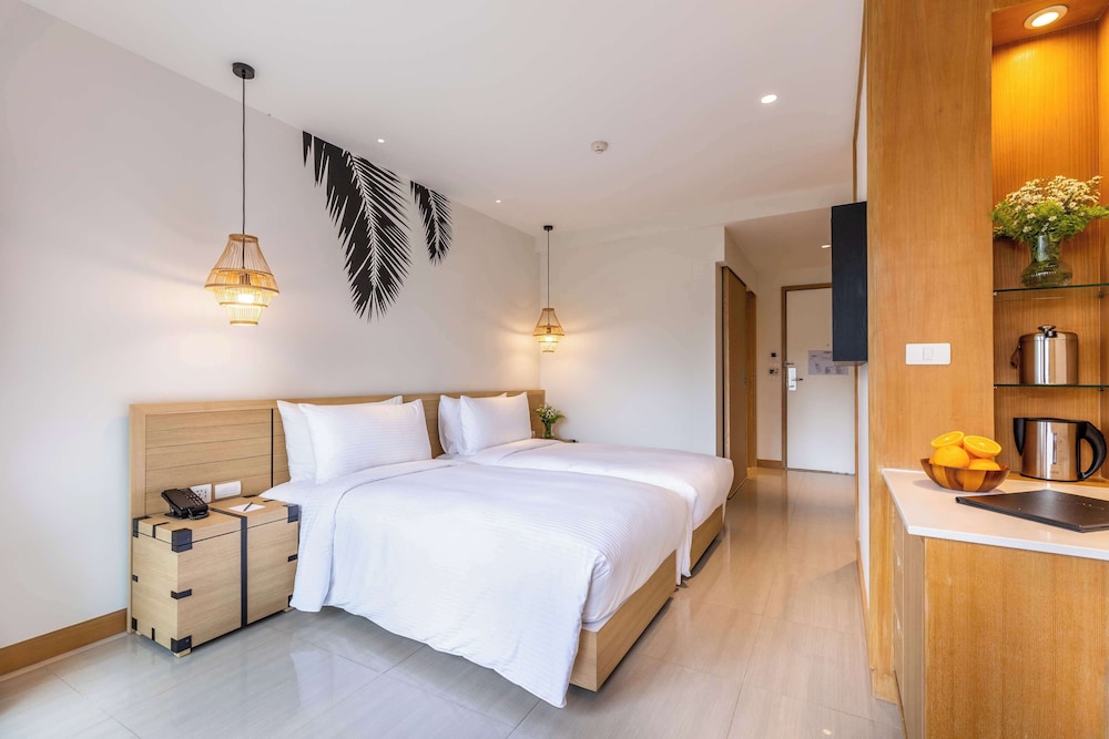 outrigger surin beach resort