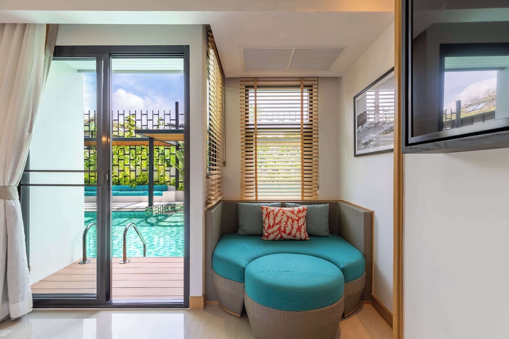 outrigger surin beach resort